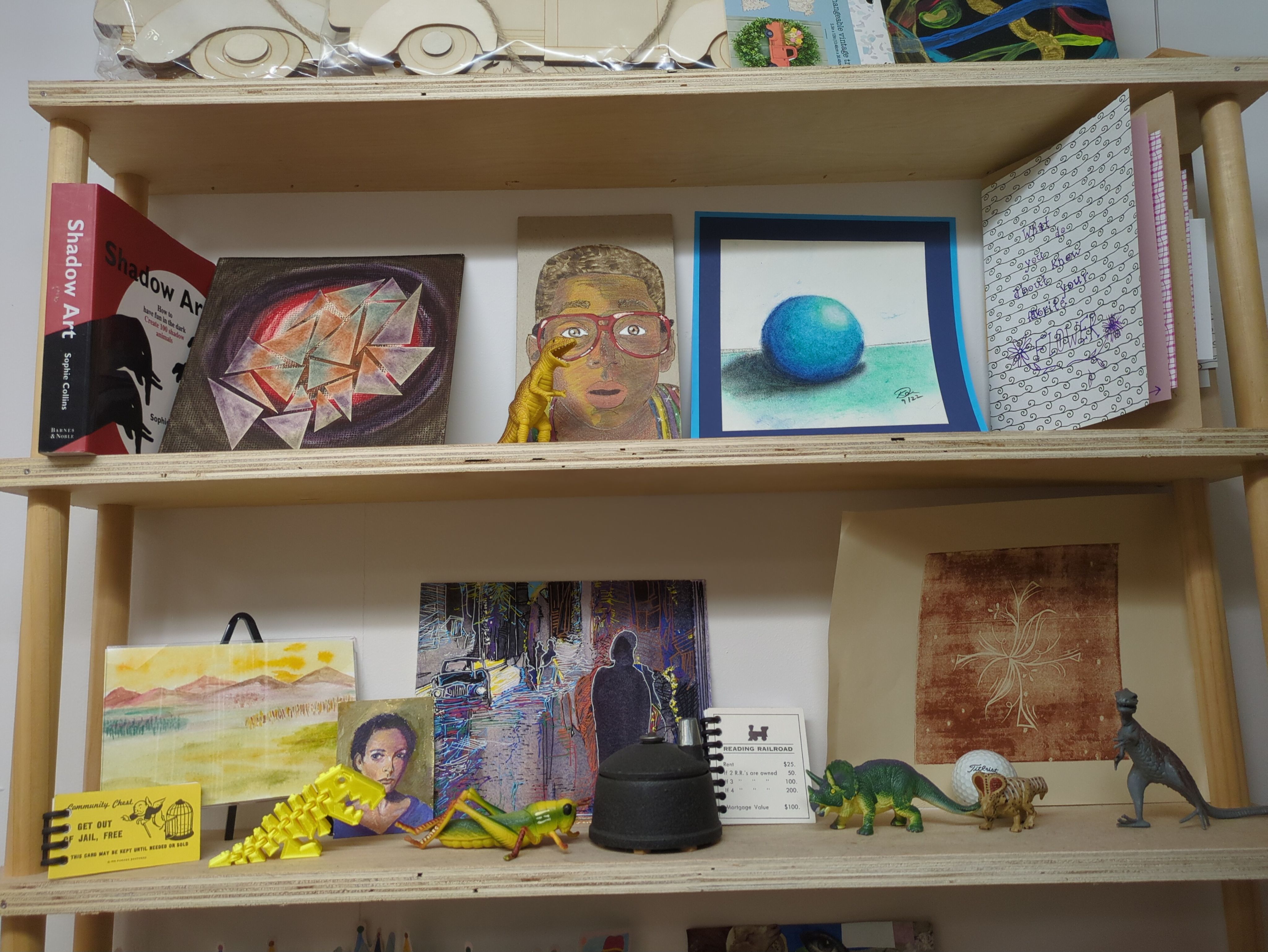Shelves of art projects.